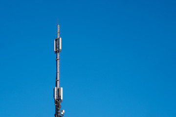 Mobile radio mast in front of blue sky