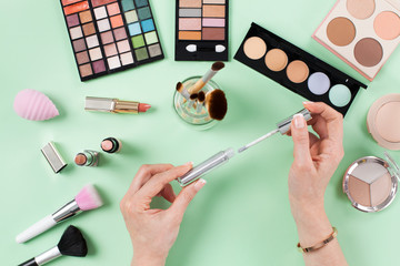 Beauty blogger with makeup cosmetics.