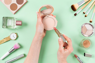 Beauty blogger with makeup cosmetics