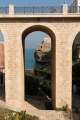 The Bridge in front of The Bay of Polignano a Mare Built on the Cliff near Bari, in Italy