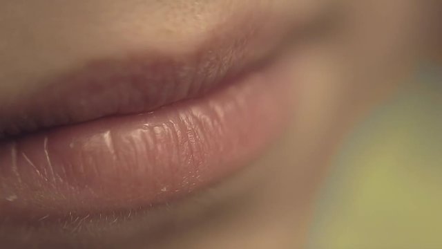 Close-up of the lips of a beautiful young woman