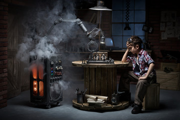 Boy with a robot helper playing chess