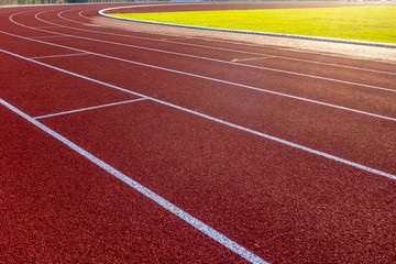 Fototapeta premium Red running track in stadium