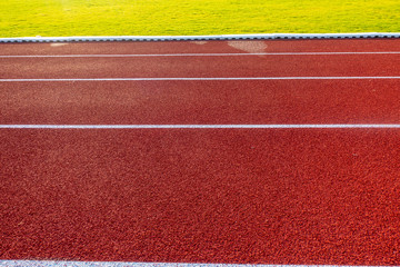 Red running track in stadium