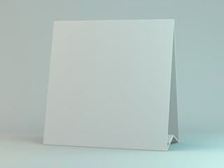 Empty desk calendar on table. Mockup design concept. 3D