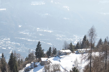 Mountain cabins during winter with a lot of snow