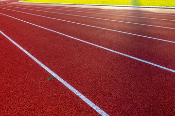 Fototapeta premium Red running track in stadium