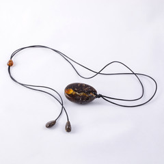 Pendant made of solar amber, jewelry made of amber.