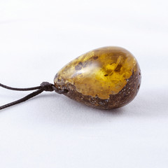 Pendant made of solar amber, jewelry made of amber.