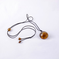 Pendant made of solar amber, jewelry made of amber.