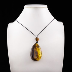 Pendant made of solar amber, jewelry made of amber.