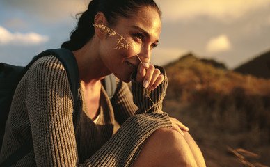 Female hiker taking a rest after a country walk