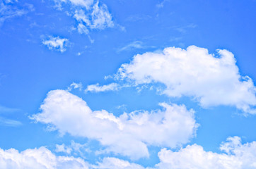 Blue sky in sunny day with brilliant white puffy clouds in rounded tops ,flat bottoms calls Cumulus clouds (cumulus humilis ,cumulus fractus) for summer season concept ,freshness natural background