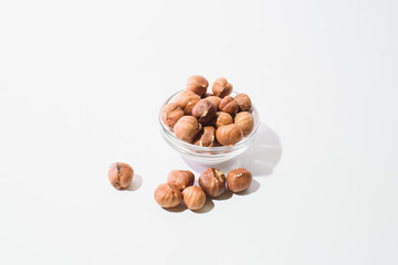 The top view of hazelnuts isolated on white background