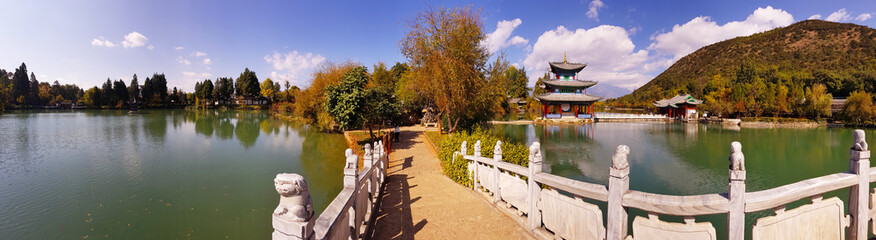 The white marble bridge in Black Dragon Pool in Jade Spring Park, Lijiang, Yunnan, China. It was built in 1737 during the Qing dynasty