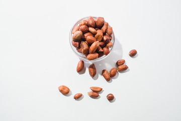 Peanuts shot Peanuts shot close up against a white backgroundclose up against a white background