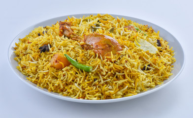 Chicken Biryani, a yummy & fluffy rice dish with spicy savory chicken pieces with salad.