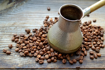 Turkish Cezve with coffee beans