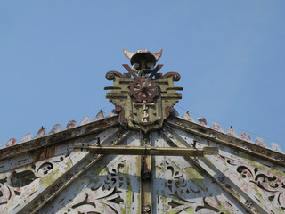 helmet with anchor and two snakes on the roof of a hangar at the quay of Antwerp