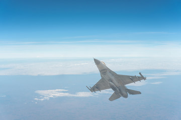The F-16 aircraft flew through the atmosphere