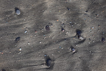 Microplastics on a beach. Famara Beach, Lanzarote.