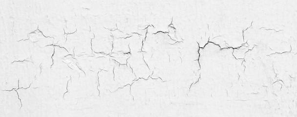 white wall with cracks