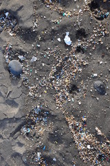 Microplastics on a beach. Famara Beach, Lanzarote.