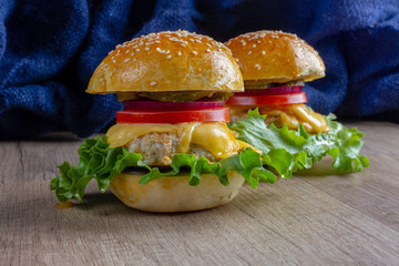 burgers on a wooden background