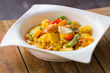 thai style spicy salad with yellow corn.