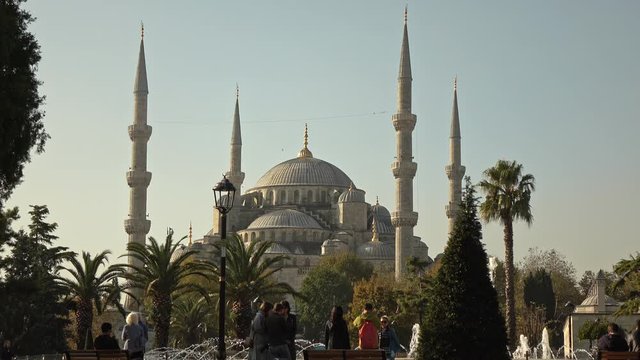 Historical part of Istanbul, Turkey - Sultan Ahmed Mosque with tourists in a summer sunny day. 4K UHD video, 3840, 2160p.