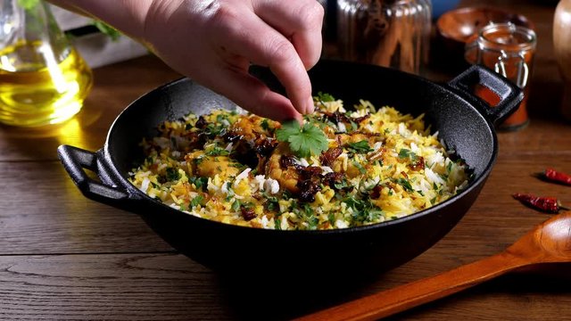 Biryani with chicken. Traditional Indian dish of rice and chicken marinated in spices and yoghurt.