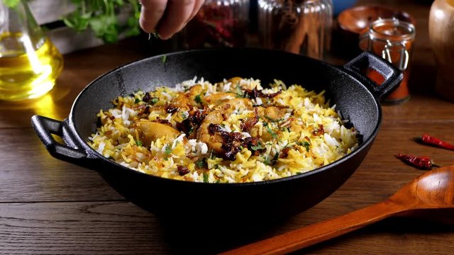 Biryani with chicken. Traditional Indian dish of rice and chicken marinated in spices and yoghurt.