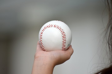 Hand Holding A Baseball