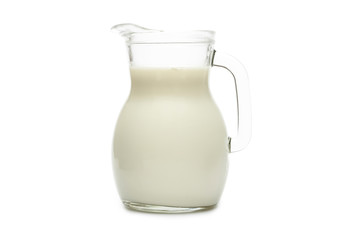 Milk. Fresh homemade milk in a jug isolated on a white background. Natural Whole Milk