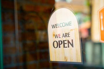 Open sign at restaurant and store
