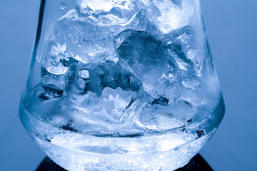 Ice melts in studio, global warming concept