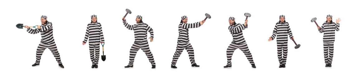 Prison inmate with spade isolated on white