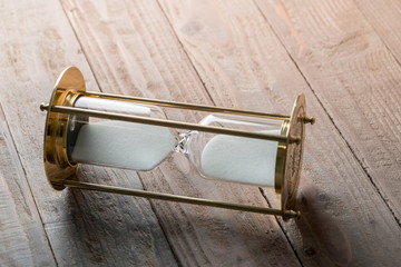 Obraz premium Sand clock, business concept teamwork & time management