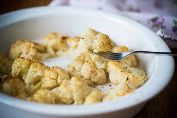 baked cauliflower with spices in ceramic form