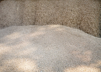 Fototapeta na wymiar Technique pours grain at the mill. Wheat and rye as food. Stock background, photo