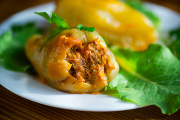 stewed in tomato sauce stuffed peppers in a plate
