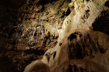 close up scenery in cave small stalactites
