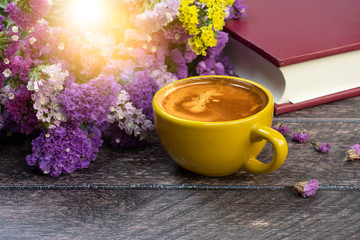 Obraz na płótnie Canvas Yellow cup of hot coffee.