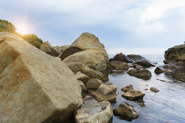 Beautiful sunset on the rocky shore of the Black sea. Crimea