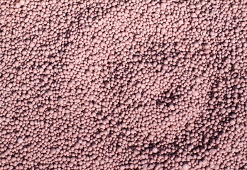 Fertilizer for the garden with minerals. Nitrates for rapid plant growth. Beautiful texture. Stock background, photo