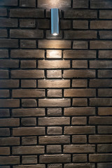 Fototapeta na wymiar Brick wall with lamp