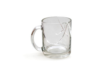 Broken cup isolated on a white with clipping path, cracked glass