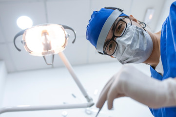 female dentist working on a patient