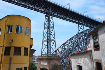 Fototapeta na wymiar Porto, Portugal, Europe. Old Town, view of the Don Luis Bridge on the Douro River, a tourist spot.