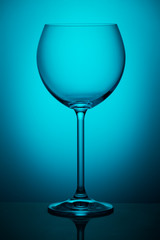 Wineglass on blue